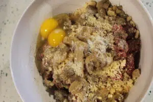  stuffed meatloaf in bowl being prepped 