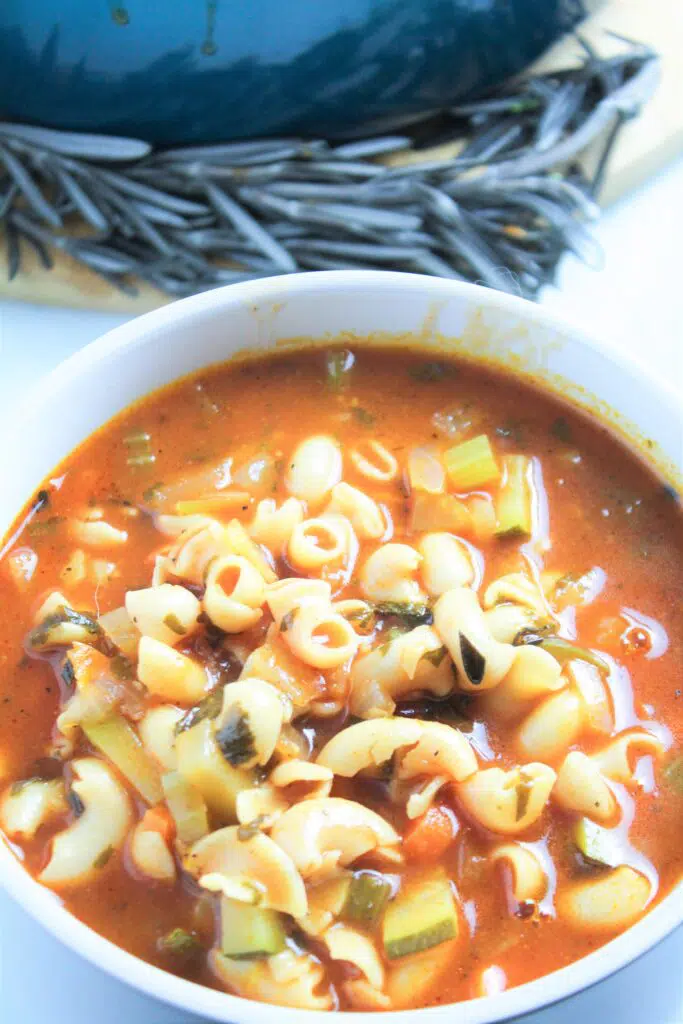 This Classic Easy Stove Top Minestrone Soup is so yummy. Your family will love all the veggies, pasta and tomato broth.