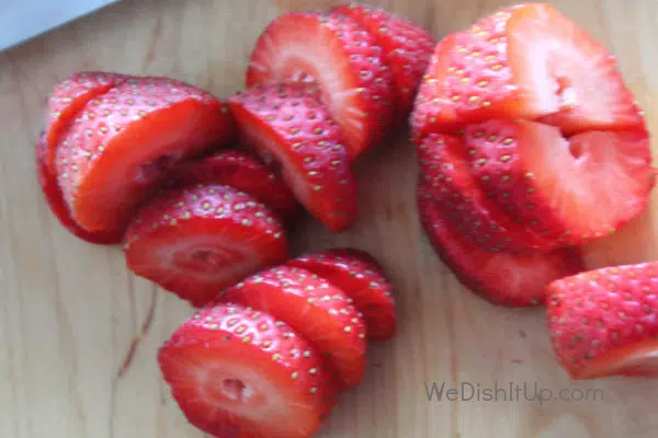 slicing fresh strawberries